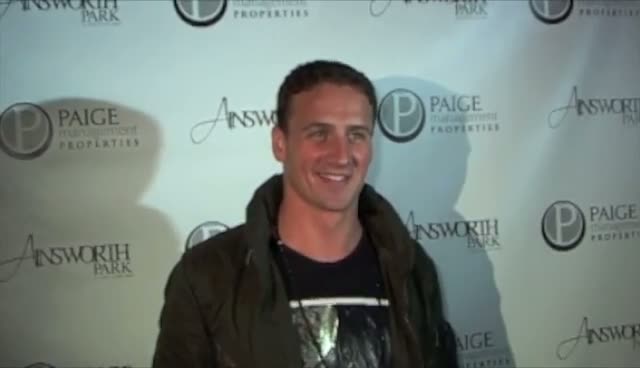 Ryan Lochte Smiles For The Cameras At A Fashion's Night Out Event In NYC