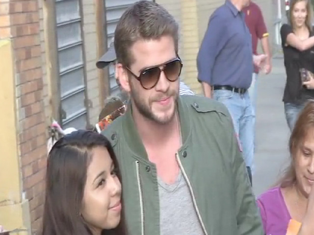 Liam Hemsworth Stops For Endless Photos With Fans Outside 'The Daily Show'