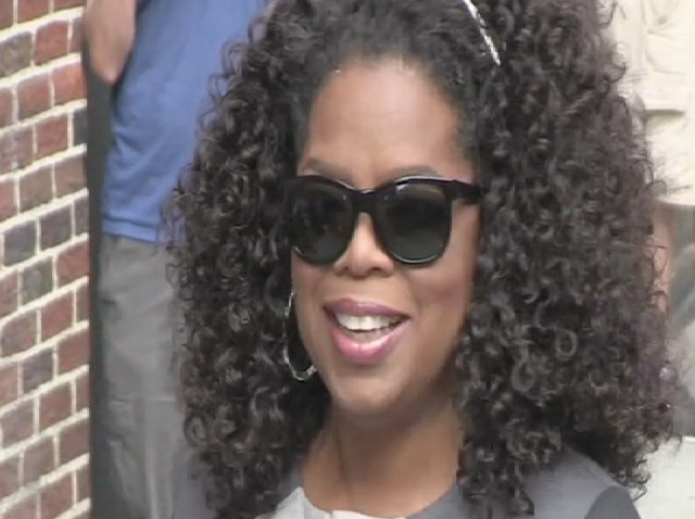 Oprah Winfrey Greets Paparazzi Outside 'Letterman' Studios