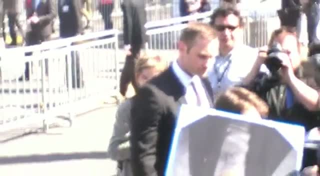 Daniel Radcliffe Tries To Sign For Every One Of His Fans On Arriving At The 2013 Independent Spirit Awards