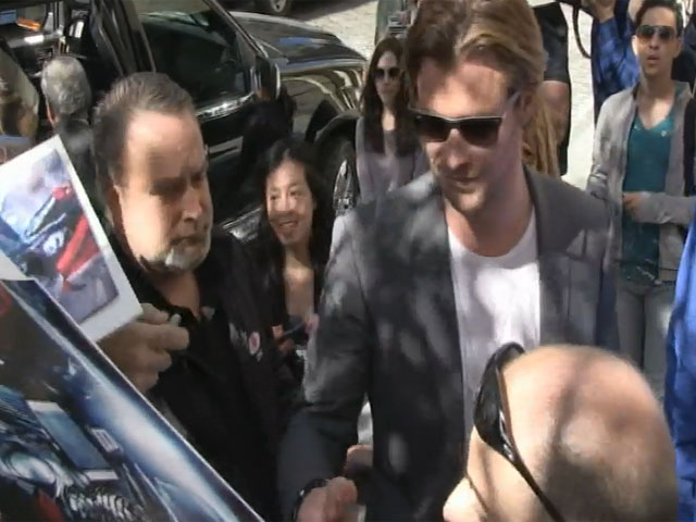 Chris Hemsworth Greets Fans Outside The Apple Store In NY