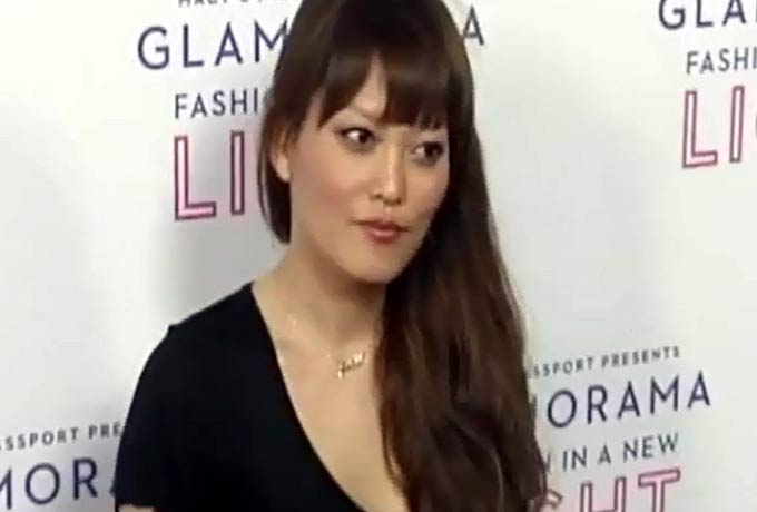 Hana Mae Lee Flashes A Peace Sign On The Red Carpet Of Macy's Passport 'Glamorama' - Part 4
