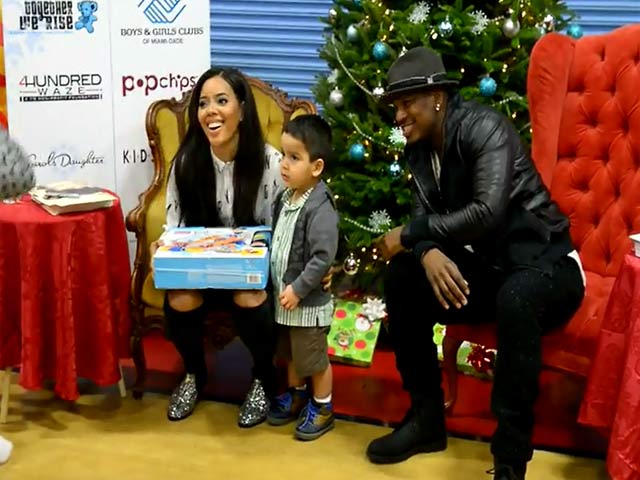 Ne-Yo And Angela Simmons Greet One Of Their Youngest Fans During Miami Charity Visit  - Part 2