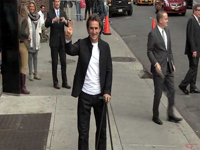 Racing Champ Alex Zanardi Waves At Photographers Outside 'Letterman'