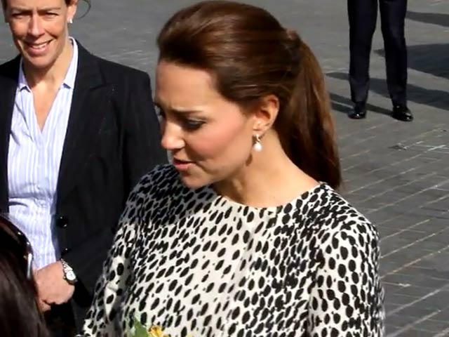 Catherine, Duchess Of Cambridge Accepts Flowers From Fans At Art Exhibition - Part 2