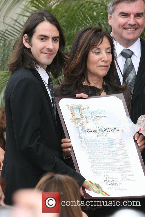 Dhani Harrison and George Harrison