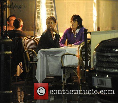 Ronnie Wood, His Girlfriend Ana Araujo Pop Outside For A Cigarette Break and During A Meal Together At A Restaurant In Mayfair. 1