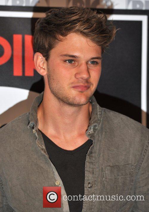 Jeremy Irvine - poses for photographers before an 'Empire Big Screen ...
