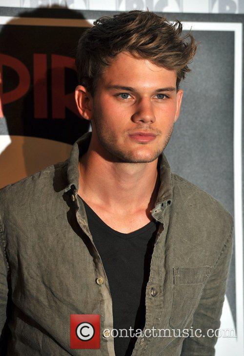 Jeremy Irvine - poses for photographers before an 'Empire Big Screen ...