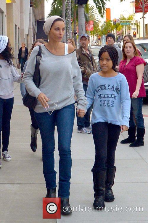 Nicole Murphy - Nicole Murphy And Daughter Are Seen Shopping On Eve