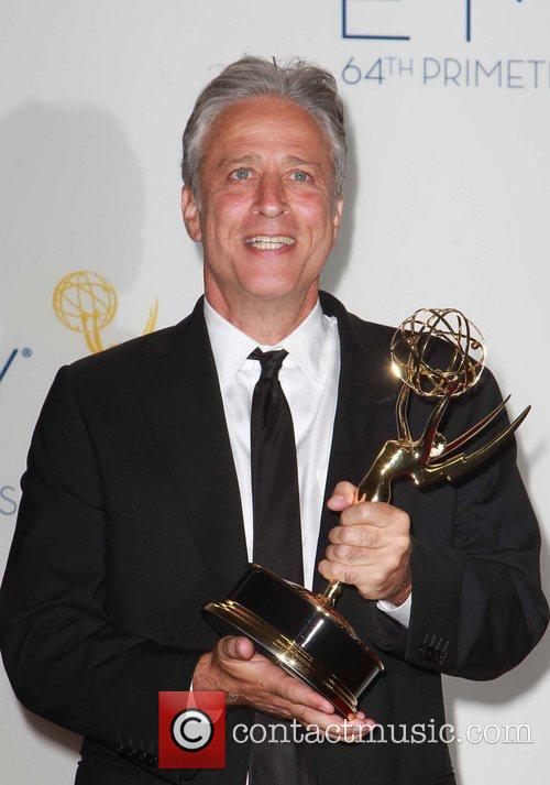 Jon Stewart collects his Emmy at this years awards show