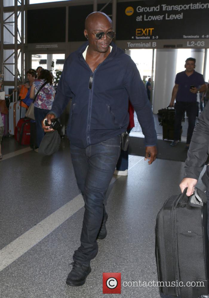 Seal pictured arriving at LAX