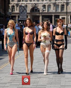 Insinuate Lingerie celebrates the launch of its new collection outside Liverpool Street station with models posing as Sex And The...