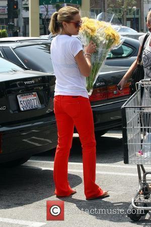 Lauren Conrad at Whole Foods shopping for groceries in West Hollywood and getting a movie at blockbuster Los Angeles, California...