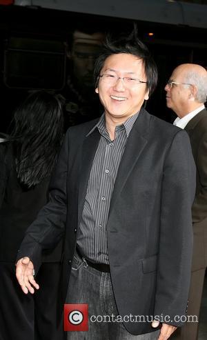 Masi Oka Attending the 'Leatherheads' Premiere held at the Grauman's Chinese theatre - Arrivals Los Angeles, California - 31.03.08