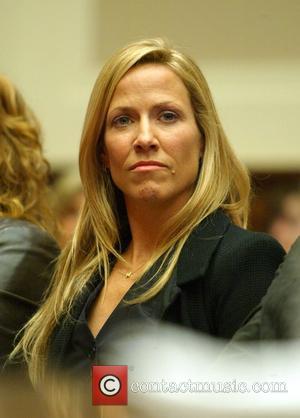 Singer/activist Sheryl Crow  testified in front of a congressional hearing on breast cancer research at the Rayburn Building Washington...