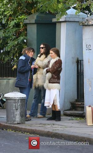 Cillian Murphy and Sienna Miller enjoying a break between filming scenes for their new movie 'Hippie Hippie Shake' in London...