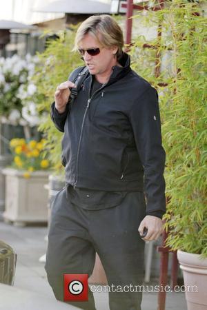 Val Kilmer leaving Sushiya restaurant on Sunset Strip wearing black sweats and carrying a backpack Los Angeles, California - 05.03.08