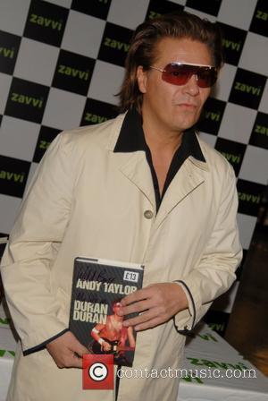 Andy Taylor of Duran Duran signing copies of his new book 'Wild Boy': My Life With Duran Duran at Zavvi,...