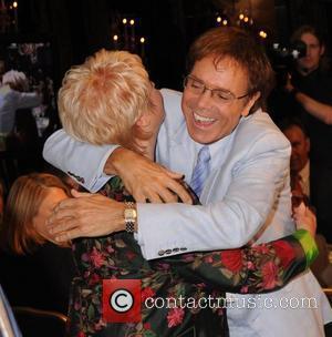 Gloria Hunniford and Sir Cliff Richard Cliff Richard's 50th Anniversary Tribute Lunch at the Dorchester Hotel to aid the Variety...