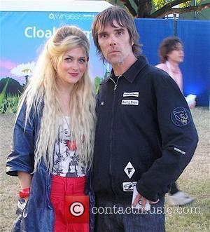 Ian Brown of the Stone Roses with the Daily Star Goss Girls Charli Morgan Celebrities at The O2 Wireless Festival...