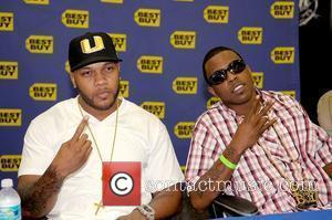FLo Rida and Brisco DJ Khaled signs copies of his new CD 'We Global' at BestBuy Pembroke Pines, Florida -...
