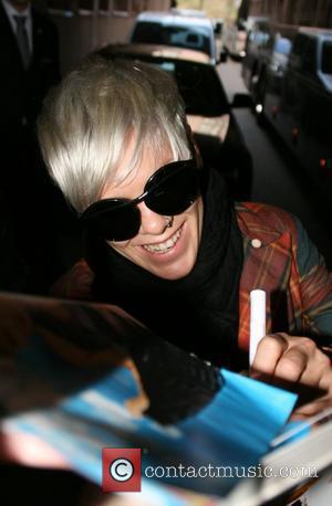 Pink aka Alecia Moore signs autographs for fans whilst leaving the Hyatt hotel in Cologne Cologne, Germany - 30.03.09