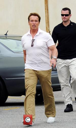 Arnold Schwarzenegger leaving a restaurant after having lunch with his family in Brentwood Los Angeles, California - 02.05.09