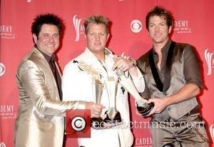 Rascal Flatts Fan Pulls Guitarist Offstage