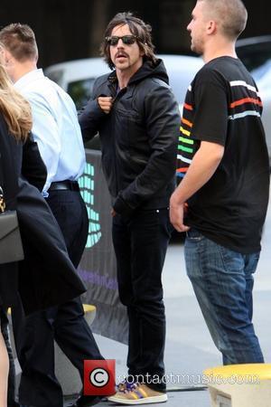 Anthony Kiedis of the Red Hot Chili Peppers Celebrities arrive to watch the Los Angeles Lakers game against the Denver...