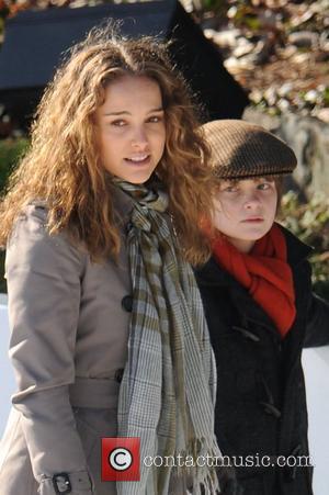 Natalie Portman and Charlie Tahan on the set for 'Love and Other Impossible Pursuits' filming at the Wolman rink in...
