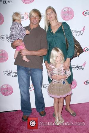 Gabrielle Reece with husband Laird John Hamilton and children Brody Jo and Reece Viola arrive at the Saves Lives concert...