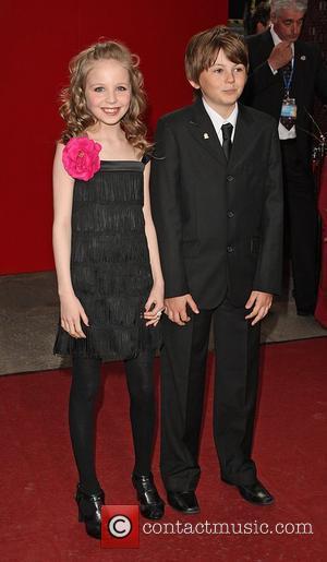 Eden Taylor-Draper and Oscar Lloyd The British soap awards 2009 held at BBC Television centre - red carpet arrivals London,...