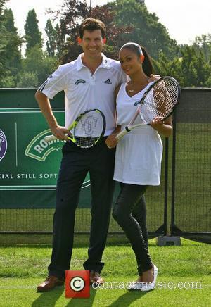 Tim Henman and Alesha Dixon entertain the queueing fans at Wimbledon on the Robinson's Mini-Court. Dixon, who has been touted...