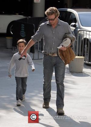 Simon Baker-Denny arrives for the first game of the NBA National Championship Tournament between the L.A. Lakers and Orlando Magic...