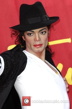 A wax figure of Michael Jackson is seen at Madame Tussauds in Hollywood, California, during a public unveiling ceremony, two...