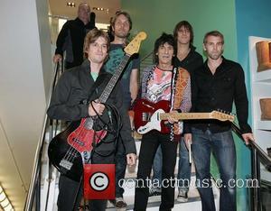 Ronnie Wood with his son Jesse's band 'Black Swan' at BT2 in Grafton Street as part of the Arthur Day...