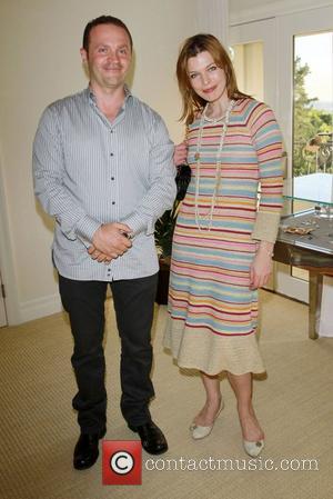 Milla Jovovich and Pacal Mouawad The Hospitality Suite hosted by Pacal Mouawad held at the Nivea For Men's Mansion...