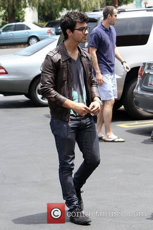 Joe Jonas and his family leave Patys Restaurant in Toluca Lake Los Angeles, California - 08.07.10