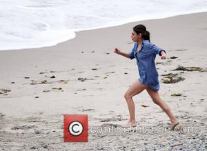 Mila Kunis filming 'Friends with Benefits' on location at a beach Los Angeles, California - 07.09.10