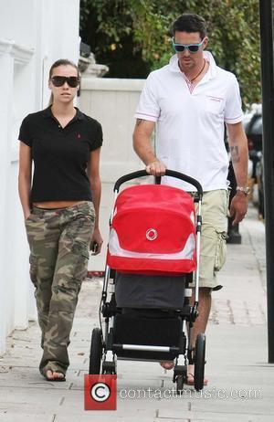 Kevin Pietersen and Jessica Taylor taking a stroll in Chelsea with their son Dylan London, England - 02.08.10