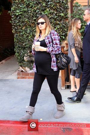 Rhea Durham receives a parking ticket as she leaves Judi's Deli Los Angeles, California - 06.01.10