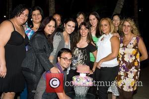 Fans of Olga Tanon surprise her with a birthday cake on the set of the first broadcast of her monthly...