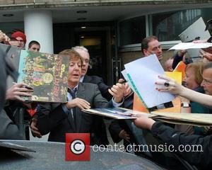 Sir Paul McCartney is mobbed by fans as he leaves the LIPA Graduation ceremony at the Philharmonic Hall.  Liverpool,...