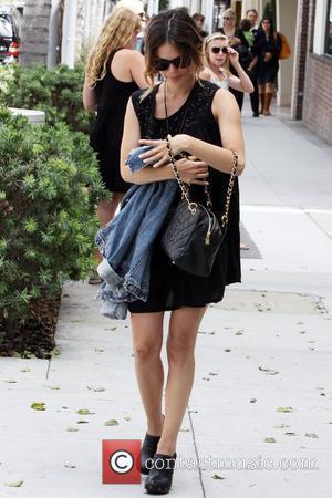 Rachel Bilson stops to sign for a gay marriage rights petition while out in Beverly Hills. Los Angeles, California -...