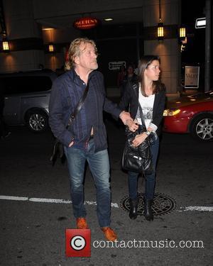 Robert Plant and his PA leaving Morton's Steak House. Toronto, Canada - 16.09.10.