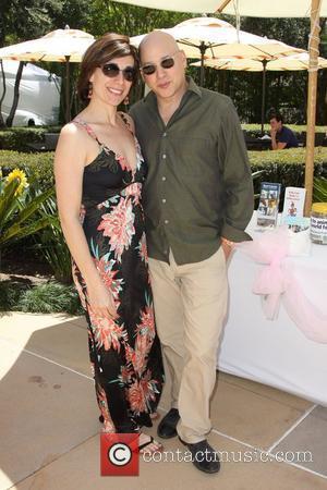 Evan Handler and his wife Elisa Atti Annual Dog And Baby Buffet Mother's Day Event at the Hyatt Regency Century...