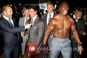 Jason Statham, Sylvester Stallone, Dolph Lundgren and Terry Crews, who took of his shirt for photographers The cast of 'The...