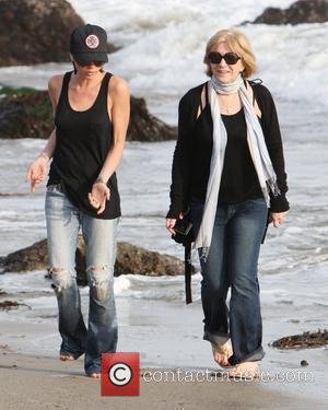 Victoria Beckham and Sandra Beckham walking on the beach Malibu, USA - 31.01.10