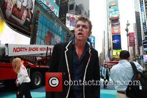 Zombies swarm tourists at Times Square in...